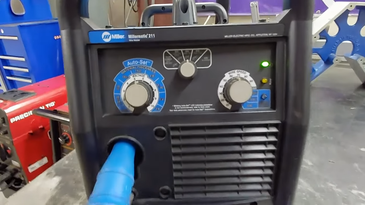 MIG welder dial showing wire speed settings and how to measure actual wire feed