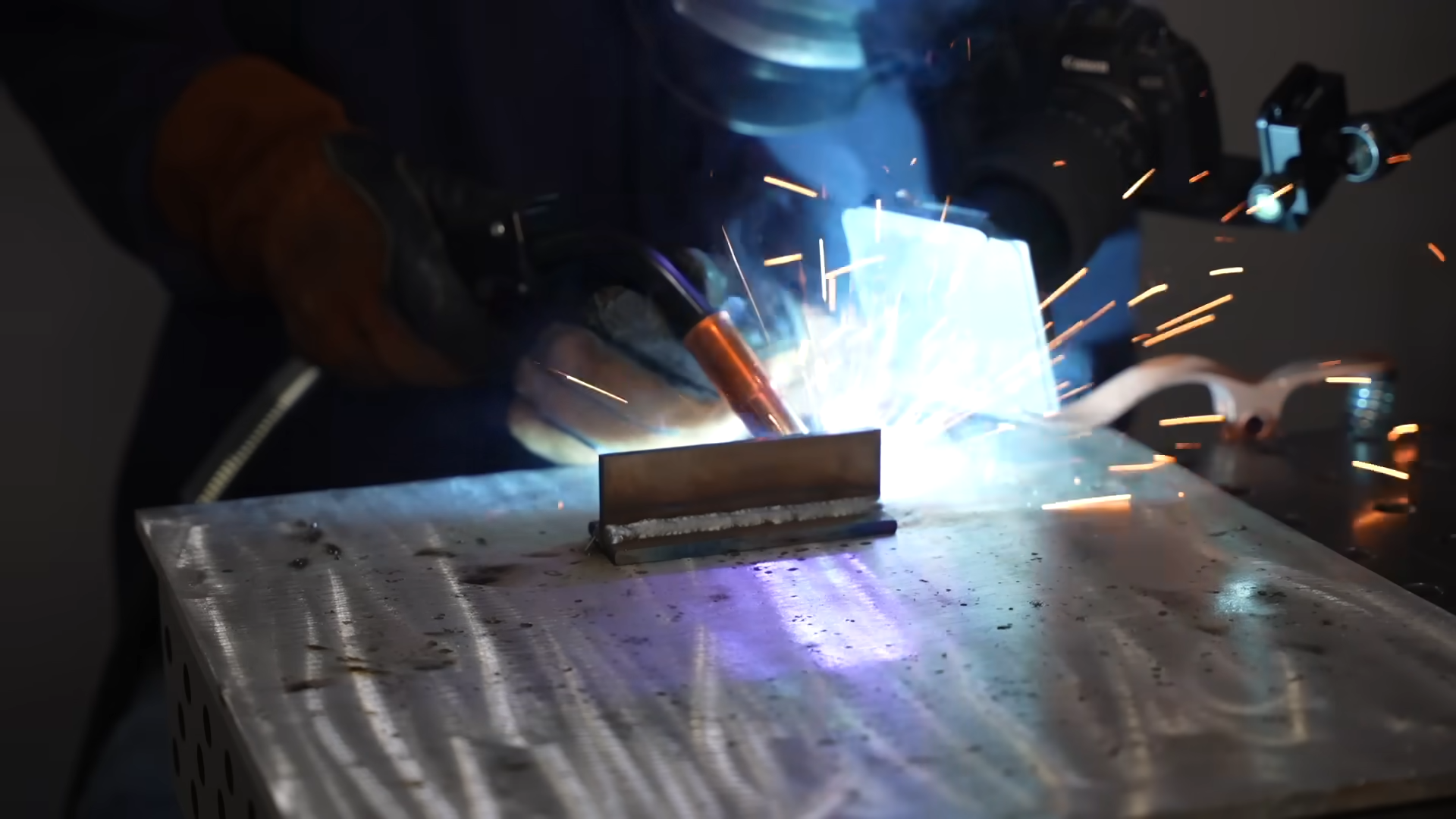MIG welding in action showing wire feed and shielding gas operation