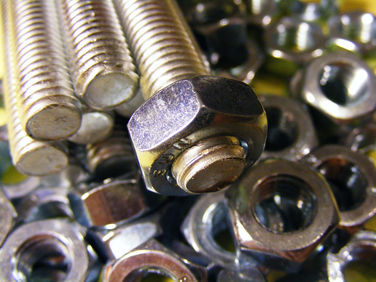 Bolts and fasteners showing various thread sizes and applications for tapped holes