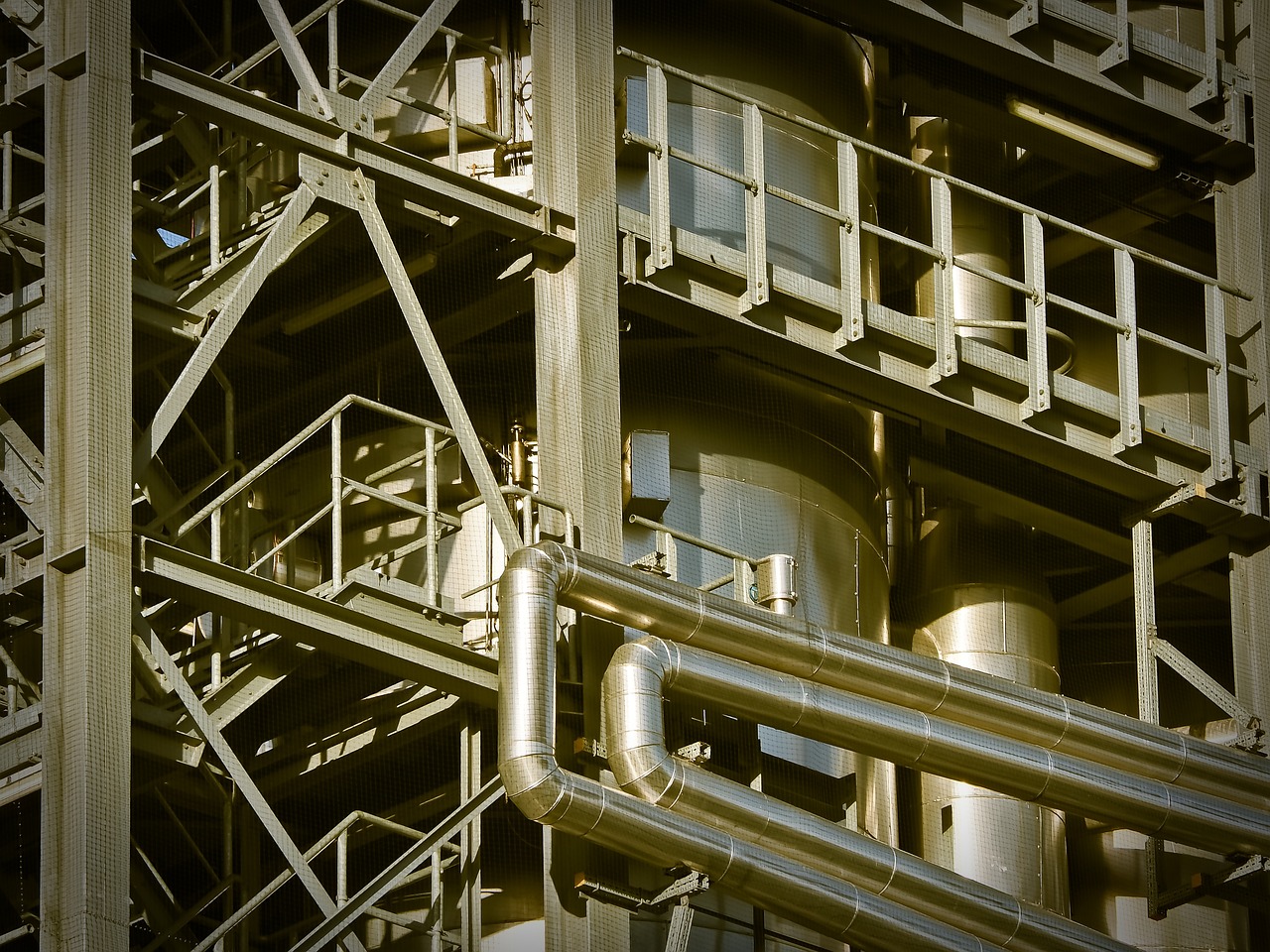 Industrial metal fabrication facility with various steel materials requiring weight calculations for production planning