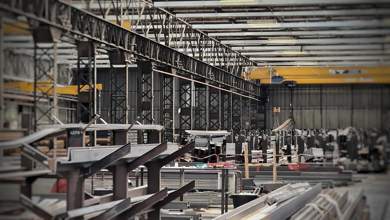 Industrial welding and fabrication shop showing professional equipment and workspace for estimating overhead costs
