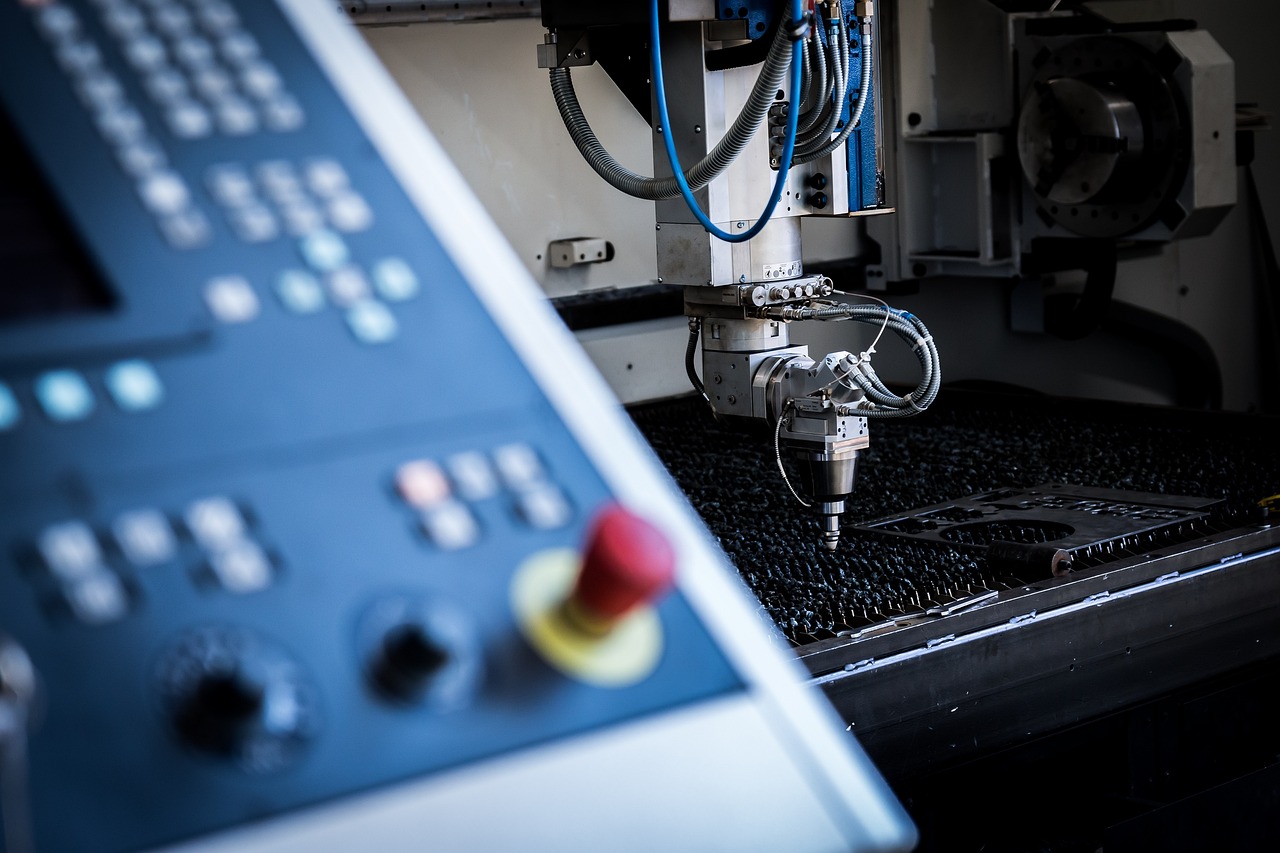 Plasma cutter creating precise straight cut on metal plate showing proper guide usage and clean edge