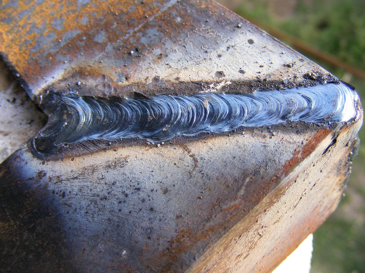 TIG welding torch with ceramic cup showing proper gas nozzle configuration for argon shielding gas flow
